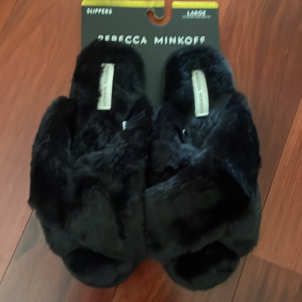 NWT Rebecca Minkoff Black Furry Bedroom Slippers with rubber soles.